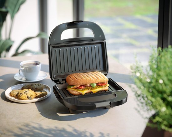 Appareil à croque-monsieur Philips HD2330/90 - 750 W - Revêtement antiadhésif - Système de rangement du cordon d'alimentation - Rangement vertical - Système Easy Lock - Noir