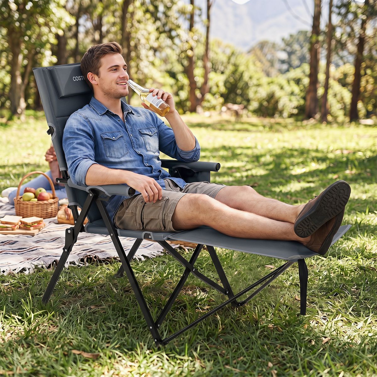 Chaise de camping pliable Coast avec repose-pieds - Dossier réglable sur 4 positions - Poche latérale et coussin - gris