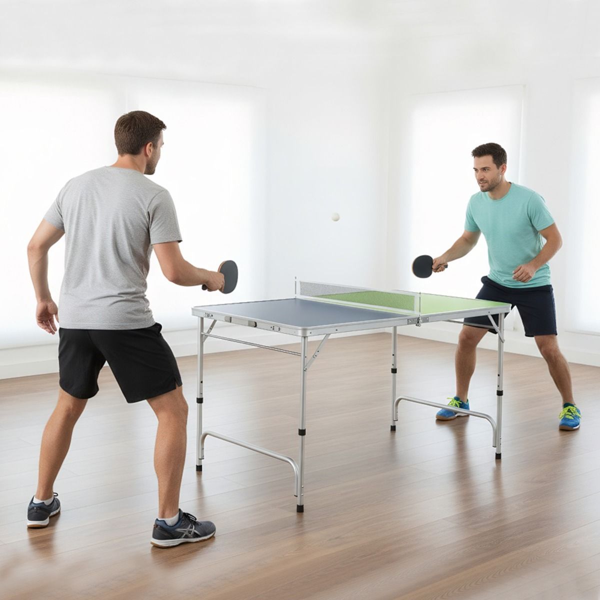 Table de ping-pong Coast Mini - Pliable - Hauteur réglable - 120 x 76 cm - Vert, bleu, argent
