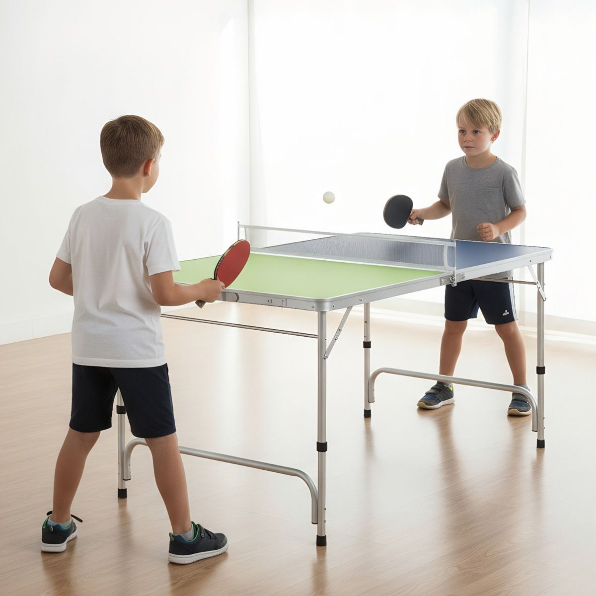 Table de ping-pong Coast Mini - Pliable - Hauteur réglable - 120 x 76 cm - Vert, bleu, argent