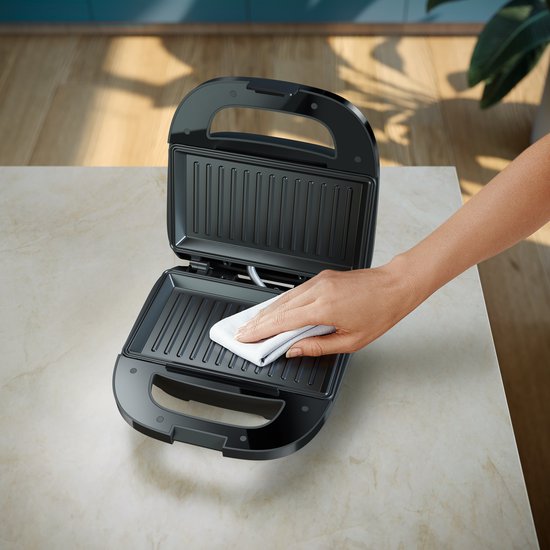 Appareil à croque-monsieur Philips HD2330/90 - 750 W - Revêtement antiadhésif - Système de rangement du cordon d'alimentation - Rangement vertical - Système Easy Lock - Noir