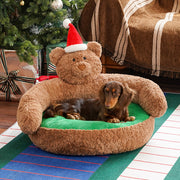 Ce banc pour animaux de compagnie avec un ours de Noël